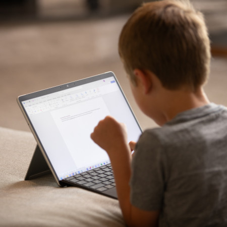 Boy using a tablet.