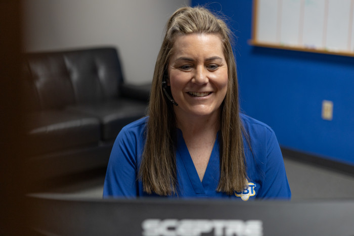 CSR assisting customers over the phone.