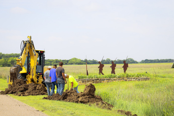 GBT digging a cable trench for fiber